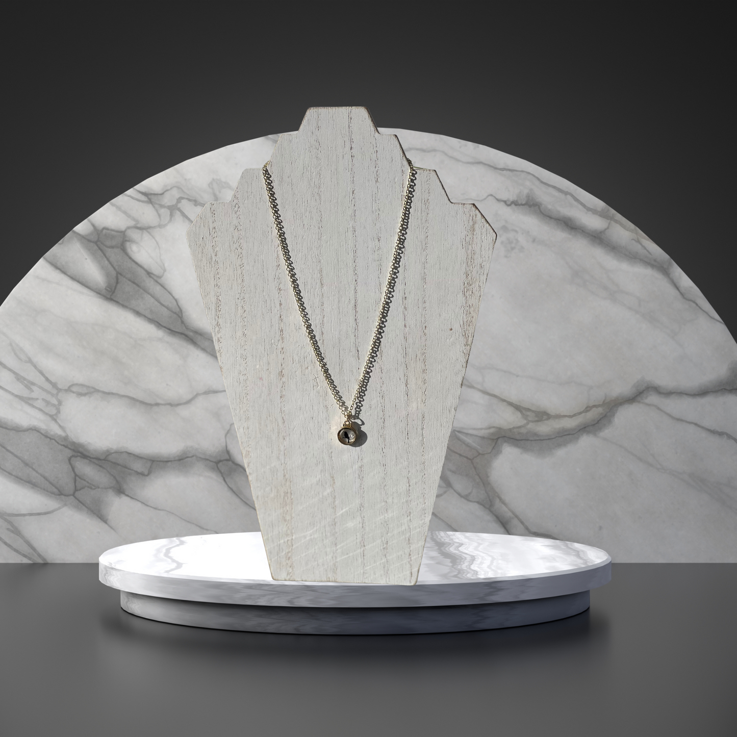 Sparrows Gold Tone Necklace with a Glass Transparent Black Sparrow Pendant